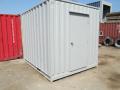 10 foot modified shipping container with man door and window