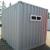 10 foot modified shipping container with man door and window