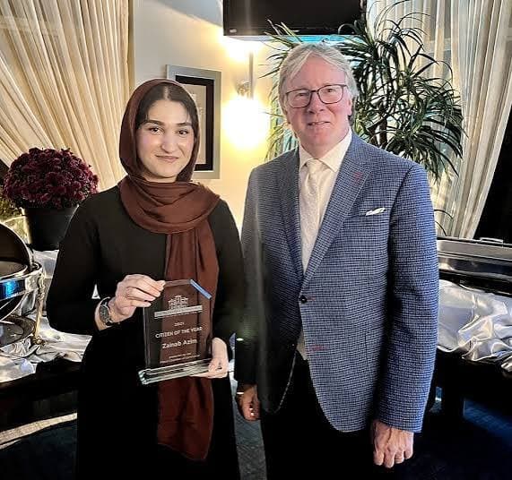 Zainab Azim receiving Milton's Citizen of the Year award