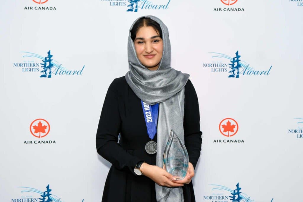 Zainab Azim holding the Rising Star Award at the Northern Lights Aero Foundation gala